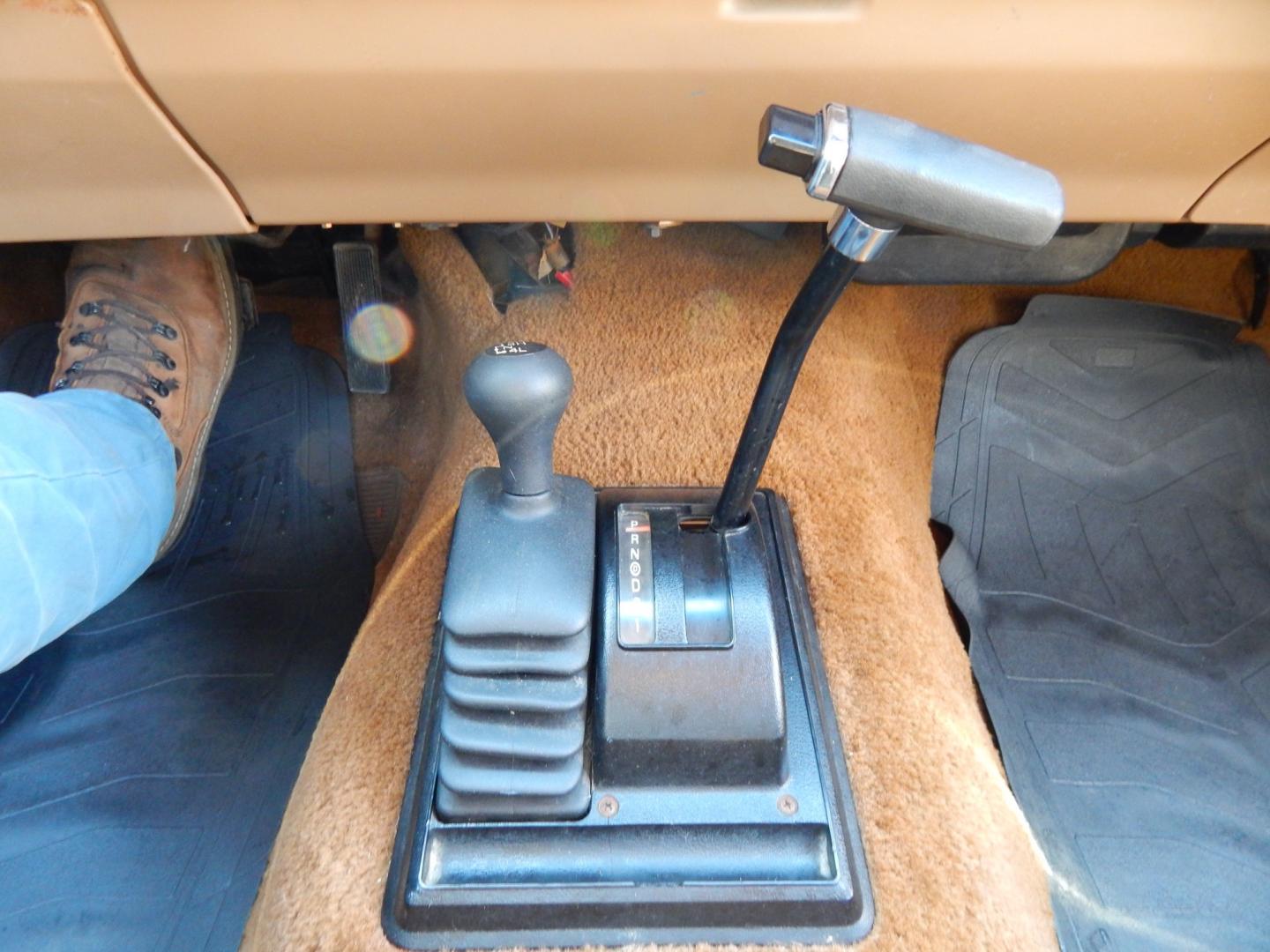 1988 Blue /Tan Ford Bronco II 4WD (1FMCU14T6JU) with an 2.9L V6 OHV 12V engine, 4-Speed Automatic Overdrive transmission, located at 6528 Lower York Road, New Hope, PA, 18938, (215) 862-9555, 40.358707, -74.977882 - Here we have a 1988 Ford Bronco 2 with a 2.9L V6 putting power to a 4x4 automatic transmission. Options include: tan cloth interior, heat/AC, XD Vision radio, power windows, cruise control, tilt steering wheel, front/rear defrost windows, spare tire cover, 15 inch alloy wheels with 4 Solarus AP tire - Photo#30